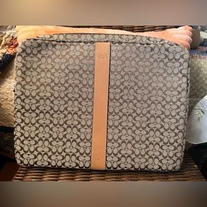Coach laptop case. 13 inches across and 10 inches in height
